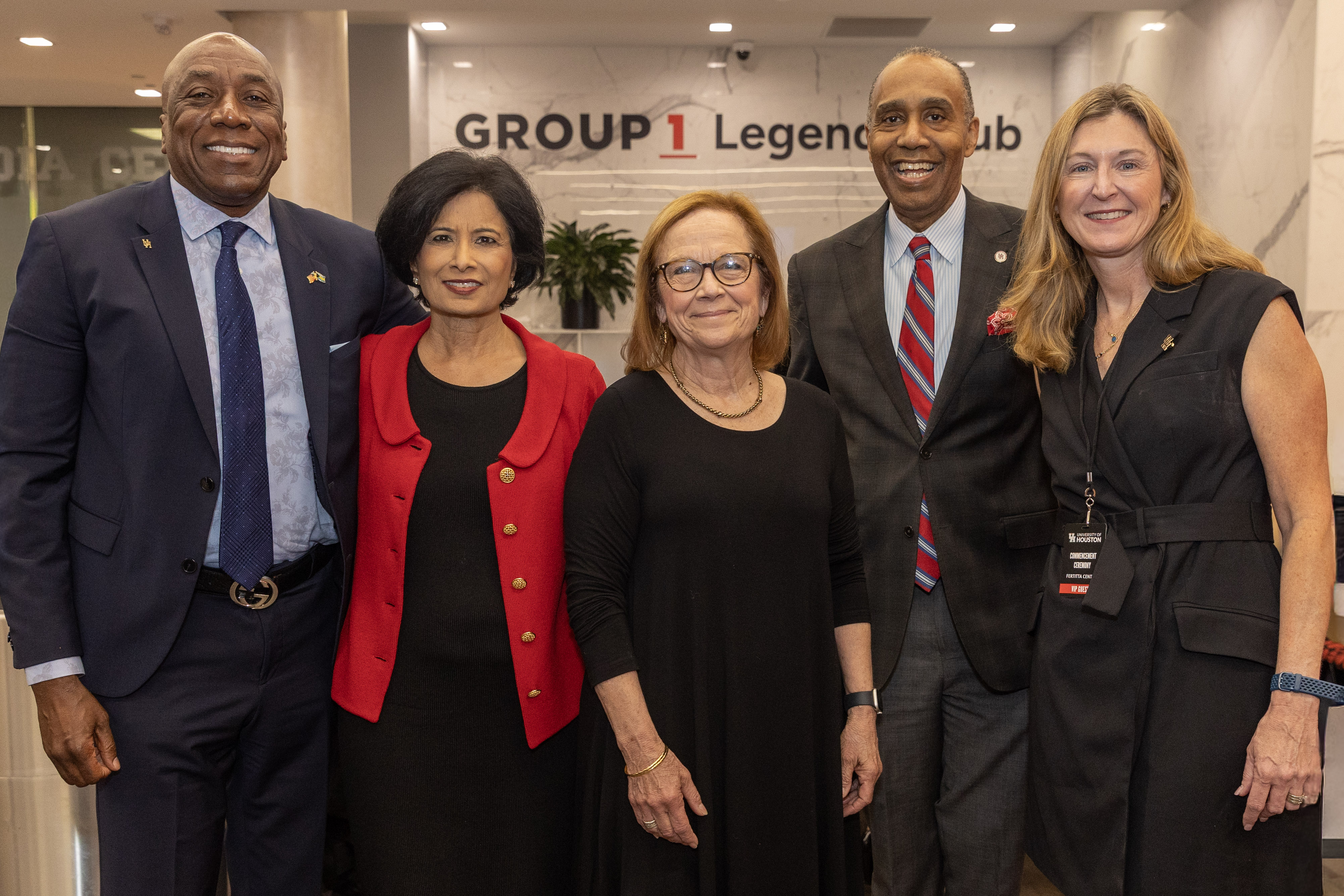UHS Regent Lynden Rose Sr. (J.D.'85), UH President Renu Khator, UH Provost Diane Z. Chase, Dean Baynes, and an attendee after the commencement ceremony.